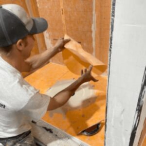 ReBath worker building shower